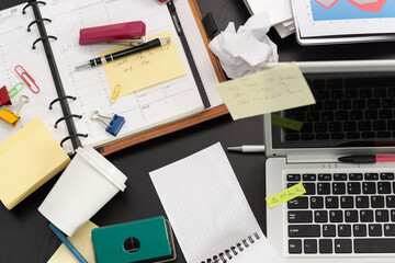 Messy and cluttered desk