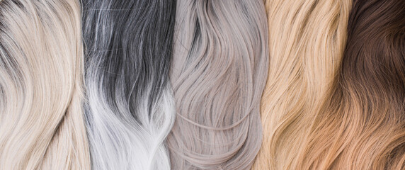 Wigs, natural and synthetic hair. Women's beauty concept. Close up photo of wig, hair for ladies