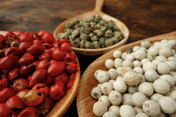 Red, green and white peppercorns spice macro