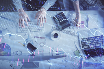 Double exposure of man and woman working together and financial chart hologram drawing. market analysis concept. Computer background. Top View.
