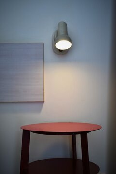 Red Round Table Under A Reading Lamp