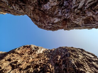 View from the bottom of deep river gorge.