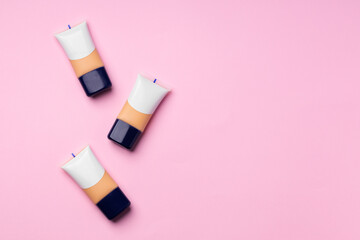 Make up foundation pack on pink background