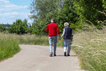 senior couple walking outdoor
