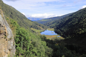 Fototapeta na wymiar The styrian lake Bodensee lies near Schladming in the Austrian mountains