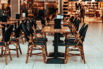 lot of empty tables in the food court