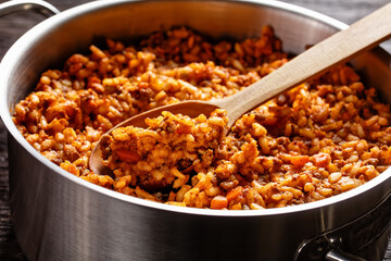 ground beef risotto bolognese in a metal stewpot