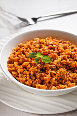 ground beef risotto bolognese in a bowl