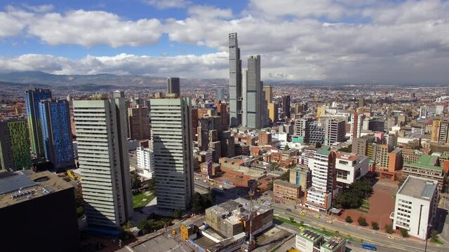 Aerial view of Bogota cityscape on a sunny day. Bogota is the sprawling capital of Colombia and one of the largest cities in South America.	
