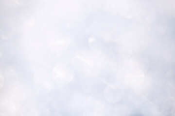 Abstract white glare shine bokeh blurred background