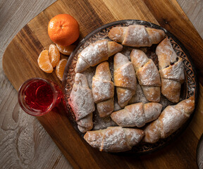 Sweet rolls filled with jam on the kitchen table