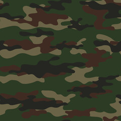 Fototapeta premium Green military camouflage vector design stylish trendy template on textiles. Forest background.