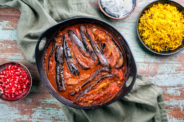 Modern style slow cooked Persian lamb eggplant stew khoresh bademjan served with rice and yoghurt...