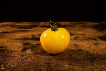 tomato on a black background