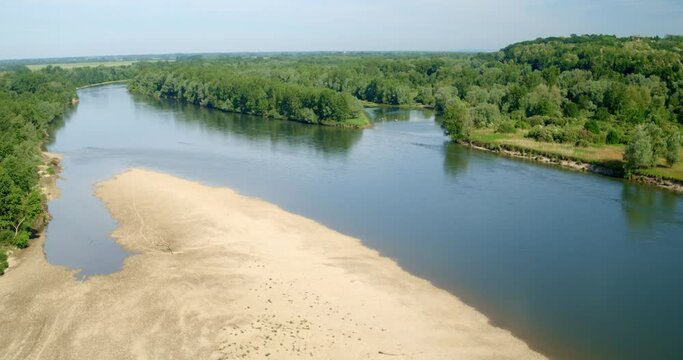 Aerial photo of the free-flowing  Drava River with natural banks and gravel bars