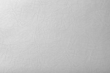 しわ模様のある白い紙の背景テクスチャー