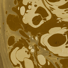 Gold luxury marble ink texture on watercolor paper background. Marble stone image. Bath bomb effect. Psychedelic biomorphic art.