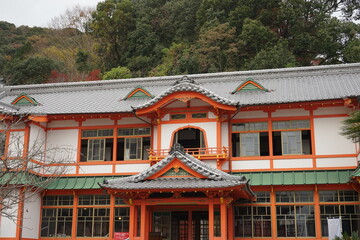 Two-storied, red-lacquered Front Gate, Roumon, of Takeo Onsen, Hotspring, in Takeo city, Saga prefecture, Japan - 佐賀 武雄温泉 元湯