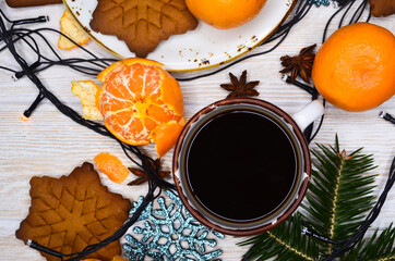 cozy warming drink on christmas holiday coffee and cookies shape snowflake cozy home atmosphere hygge concept