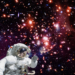 Fototapeta na wymiar Astronaut and starfield. The elements of this image furnished by NASA.