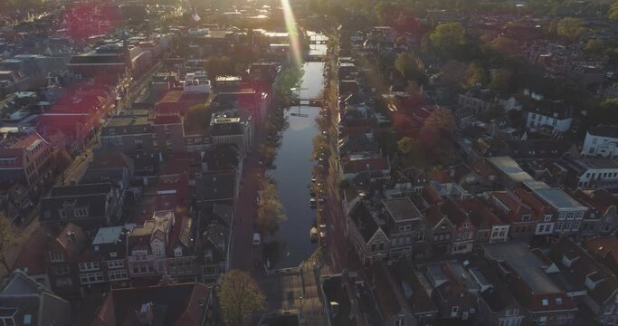 Aerial helicopter shot of the canals in the emty (Covid lockdown) peacefull historical inner city of Alkmaar.