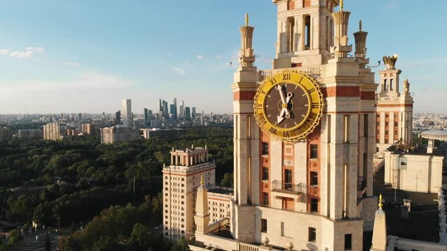 Big vintage clock on tower of Lomonosov Moscow State University Stalin Skyscraper.