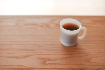 シンプルなコーヒーとコーヒーカップの写真