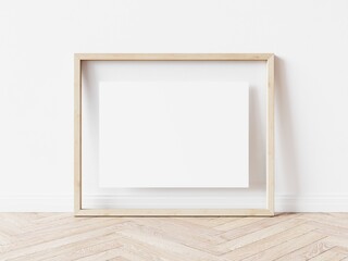 Fototapeta na wymiar Rectangular wooden picture frame with thin light border and white background standing on wooden floor. 3D Illustration.