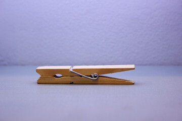 Close-up of a log clip that can hang photos and decorations