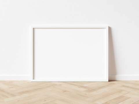 Blank white horizontally oriented rectangular exhibition background standing on wooden parquet floor leaning on white wall. 3D illustration.