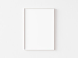 Single blank vertically oriented rectangular picture frame with thin white border hanging on white wall. 3D illustration. - obrazy, fototapety, plakaty