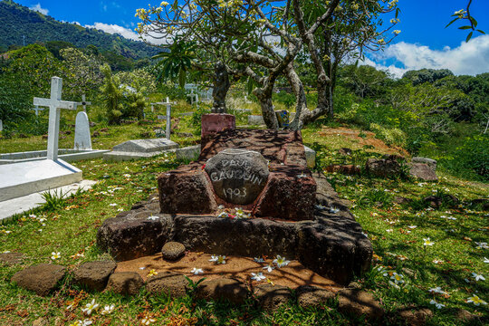French Polynesia, Marquesas, Hiva Oa Island. Grave stone  of the famous painter Paul Gaugin. 