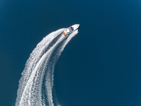 Aerial view of speed boat. - Powered by Adobe