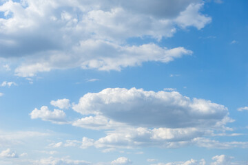 Naklejka na ściany i meble clouds in the blue sky. Background cloud summer