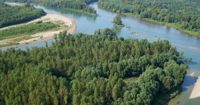 Aerial view of the natural and wild confluence of two rivers (the Mura and the  Drava)