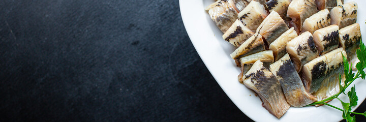 whole herring fresh fish or salted seafood ready to cook and eat on the table pescetarian diet for healthy meal snack outdoor top view copy space for text food background rustic image 