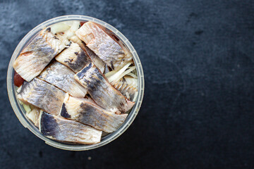 whole herring fresh fish or salted seafood ready to cook and eat on the table pescetarian diet for healthy meal snack outdoor top view copy space for text food background rustic image 