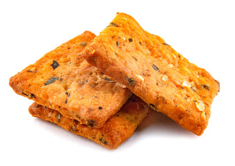 Crispy breads with salt and spices are isolated on a white background.
