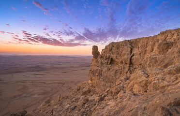 Beautiful landscape with cloudy sunrise over Machtesh Ramon (Ramon Crater), Negev Desert, Israel