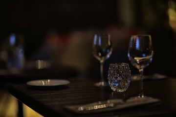 glass white wine restaurant interior, abstract evening dinner with alcohol at the bar