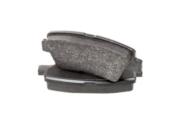 brake pads one on top of the other demonstrate the thickness of asbestos abrasive coating, new car...