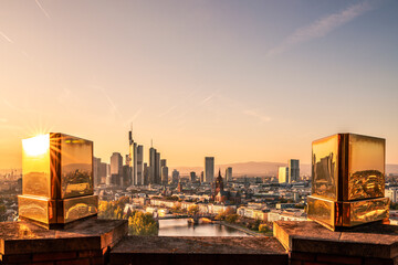 The Main with the Frankfurt skyline in the evening, at sunset. Nice overview of the city and its...