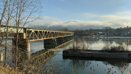 Mont St-Hilaire in clouds with the Railway Bridge over the Richelieu River