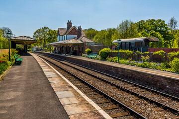 Fototapeta na wymiar A view along a station on the Bluebell railway in Sussex, UK on a sunny summer day