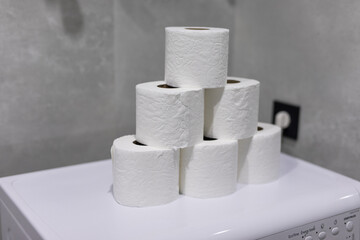 Rolls of toilet paper in bathroom at home