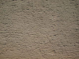 old gray weathered plastered light wall, textured cement wall