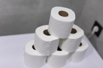 Rolls of toilet paper in bathroom at home