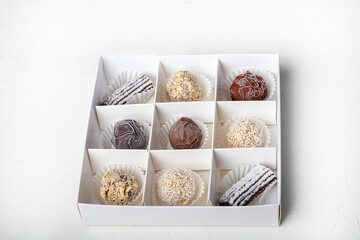 Handmade sweets. From dried fruits and nuts with the addition of cocoa. Home delivery. Festive concept. Quarantine.