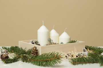 Wooden box christmas centerpiece. Simple and small home decoration with candles in wooden box.
