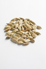 dried cardamom seeds isolated on white